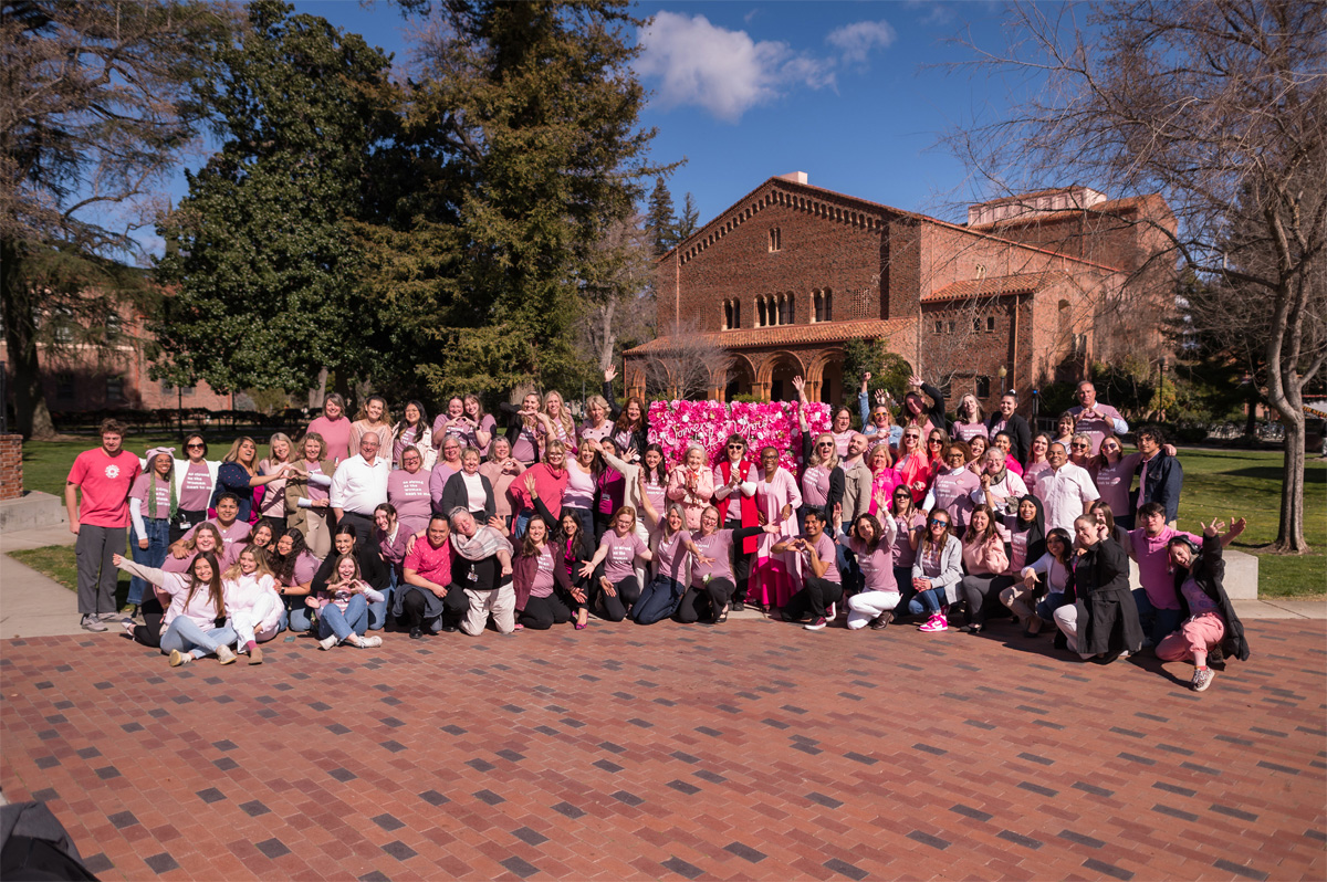 Chico State staff pose for Pink Shirt Day