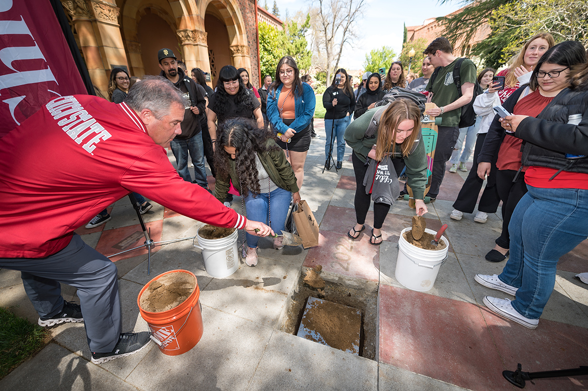 Interim Provost Steve Perez helps with Time Capsule Burial