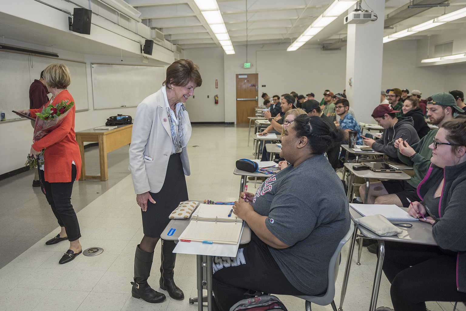 Provost Debra Larson (center) talks with students of the class CIVL 321: Fluid Mechanics, after giving recognition for Outstanding Professor Award by the Faculty Recognition and Support Committee (FRAS)