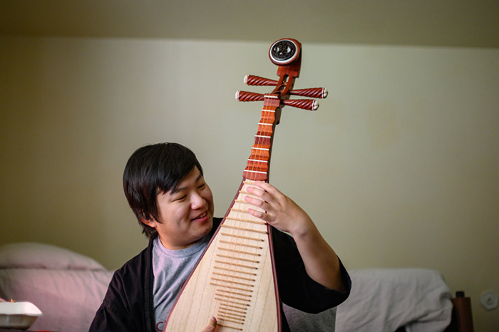 Student practicing an instrument at home